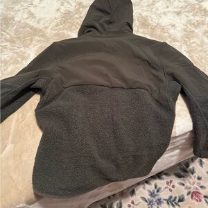 Lululemon Tundra Trek Hooded Jacket in a dark olive color. size large